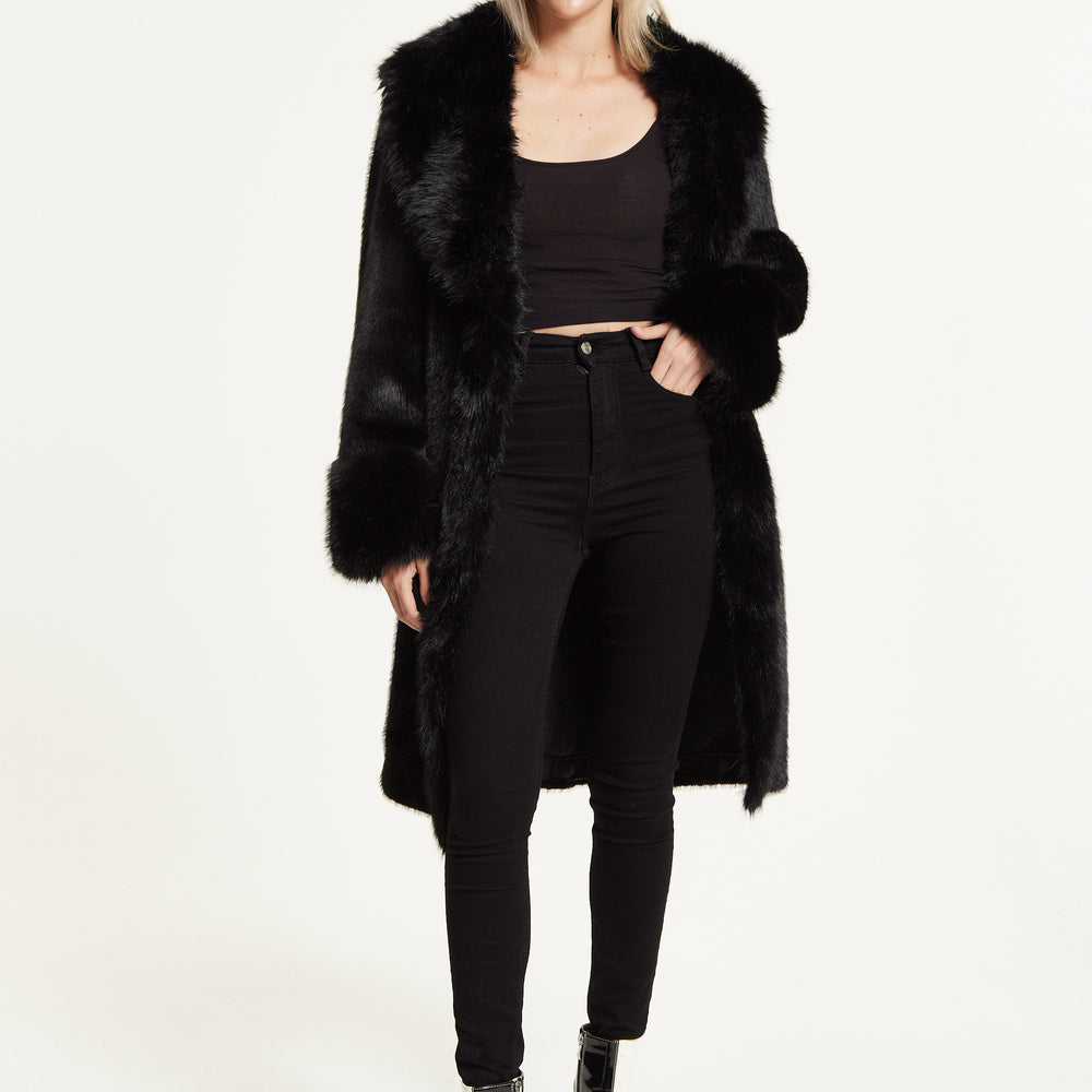
                  
                    Long Faux Fur Coat in Black
                  
                
