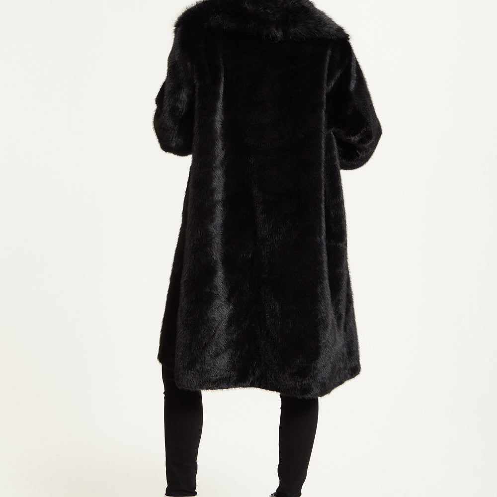
                  
                    Long Faux Fur Coat in Black
                  
                