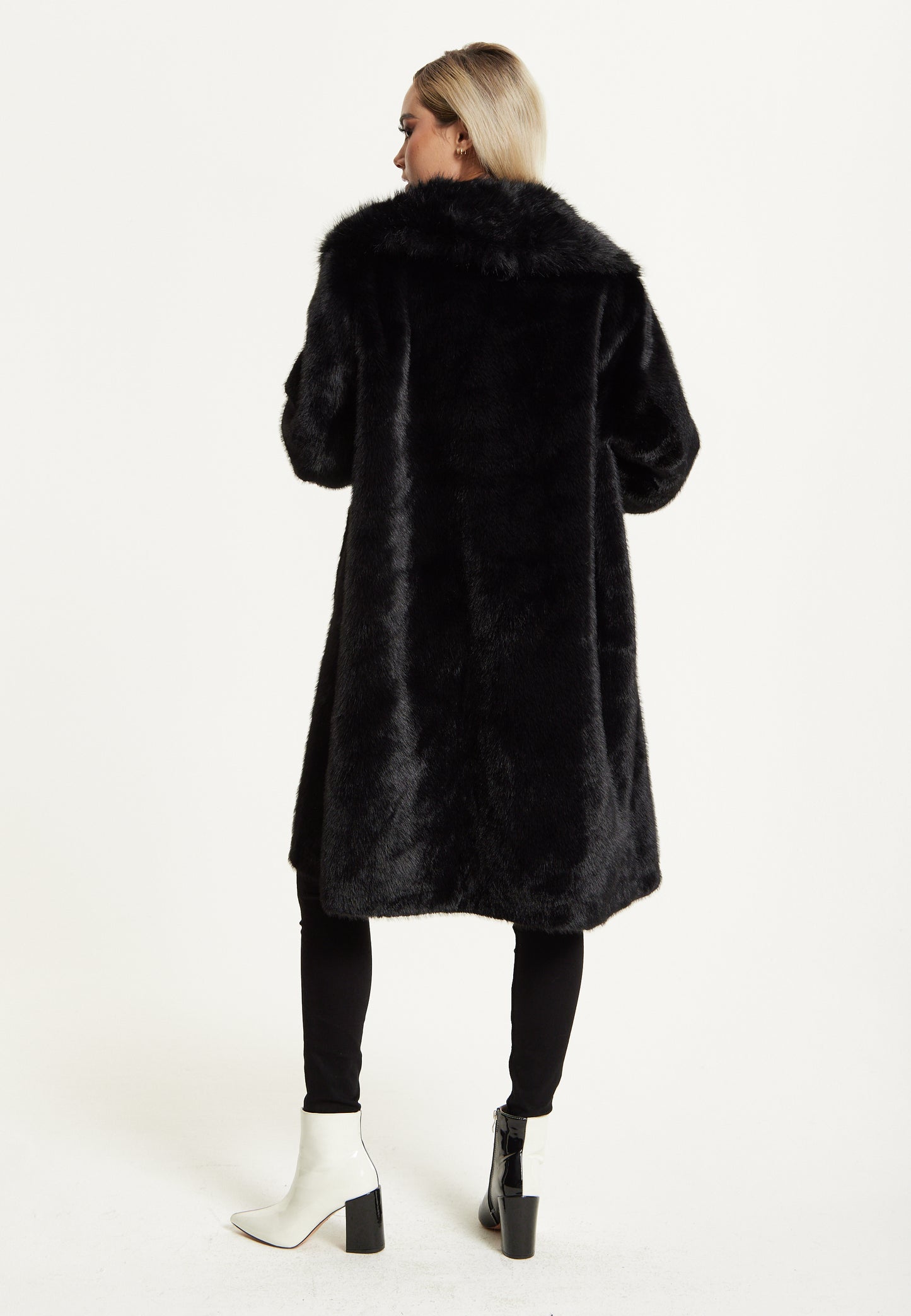 
                  
                    Long Faux Fur Coat in Black
                  
                