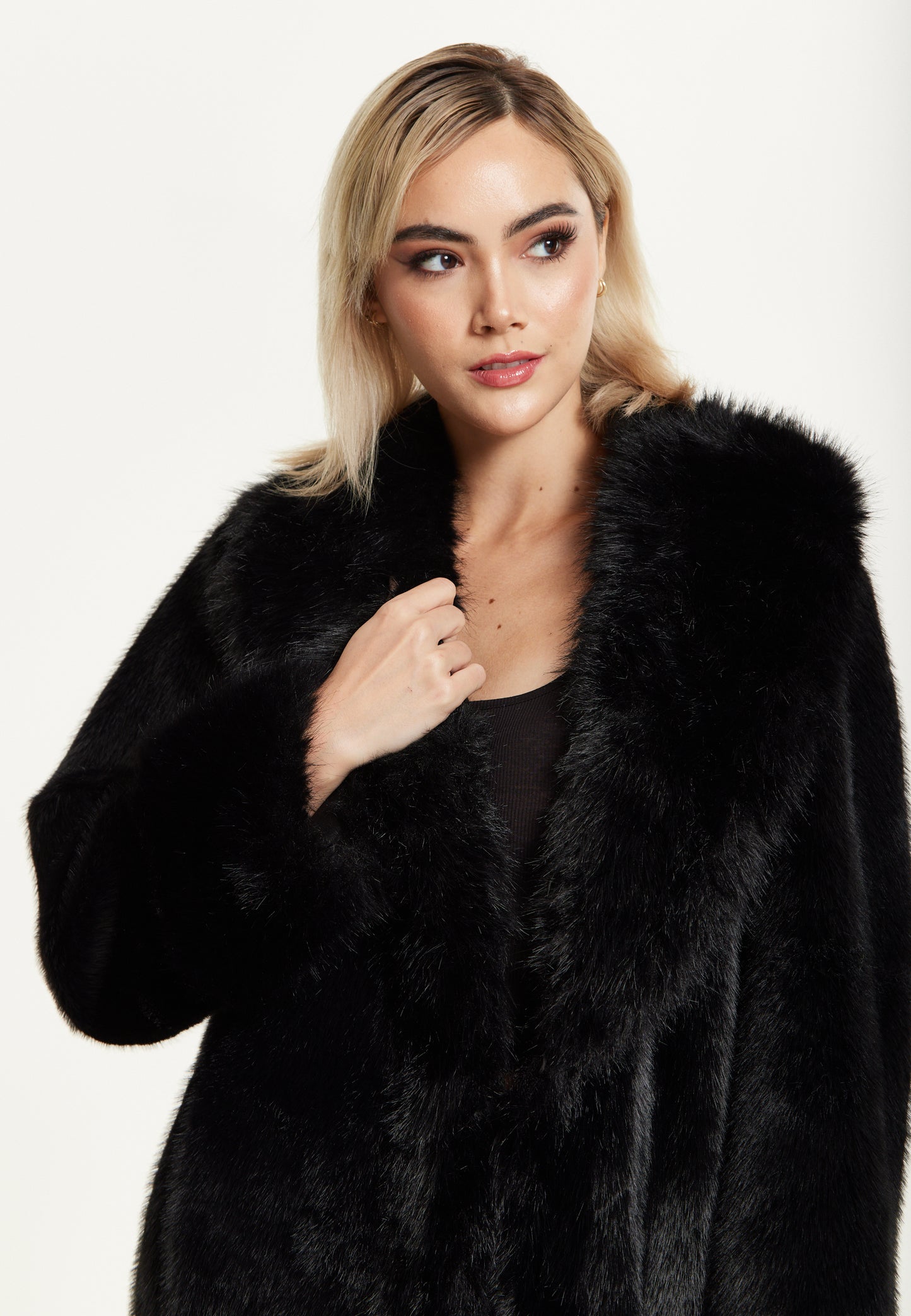 
                  
                    Long Faux Fur Coat in Black
                  
                