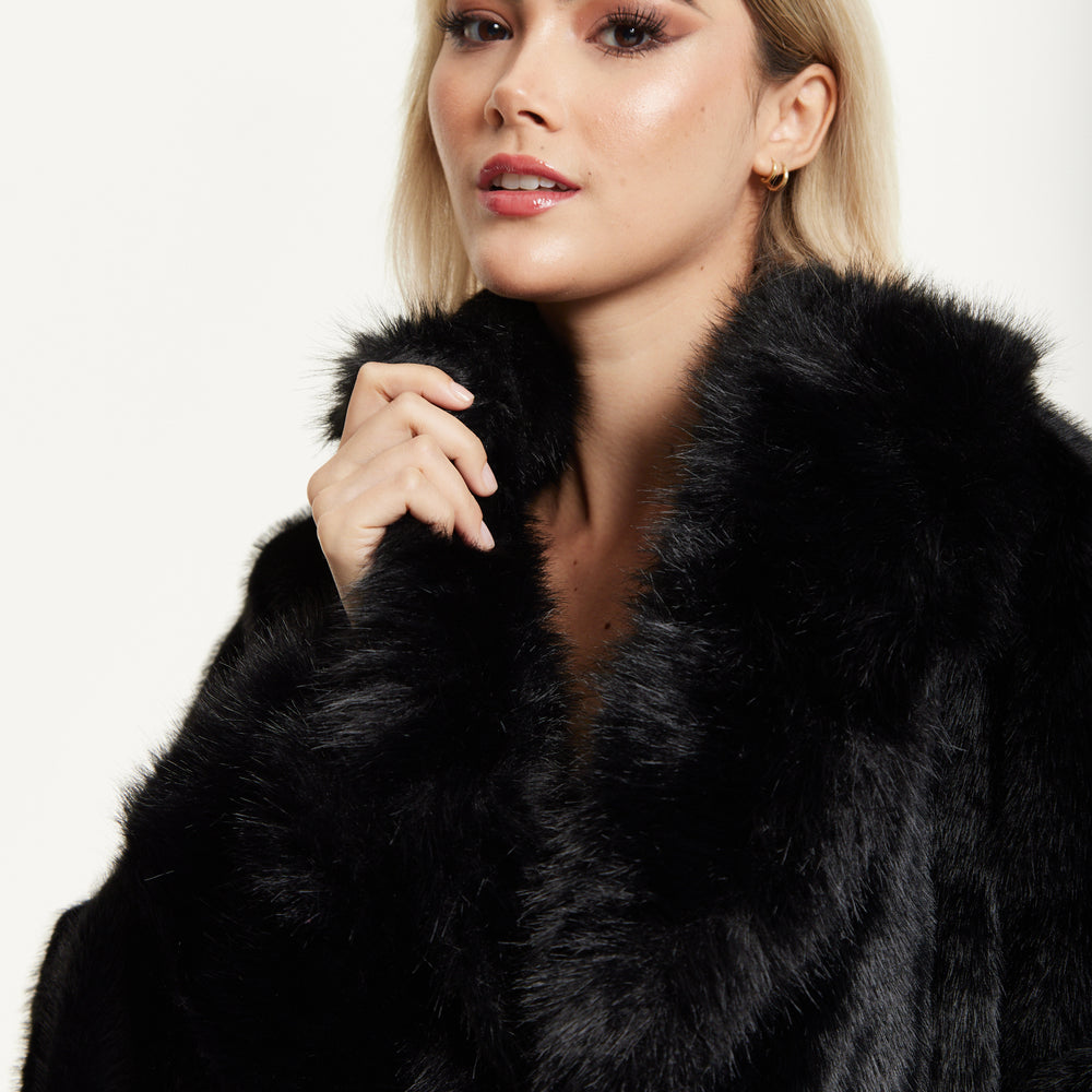 
                  
                    Long Faux Fur Coat in Black
                  
                