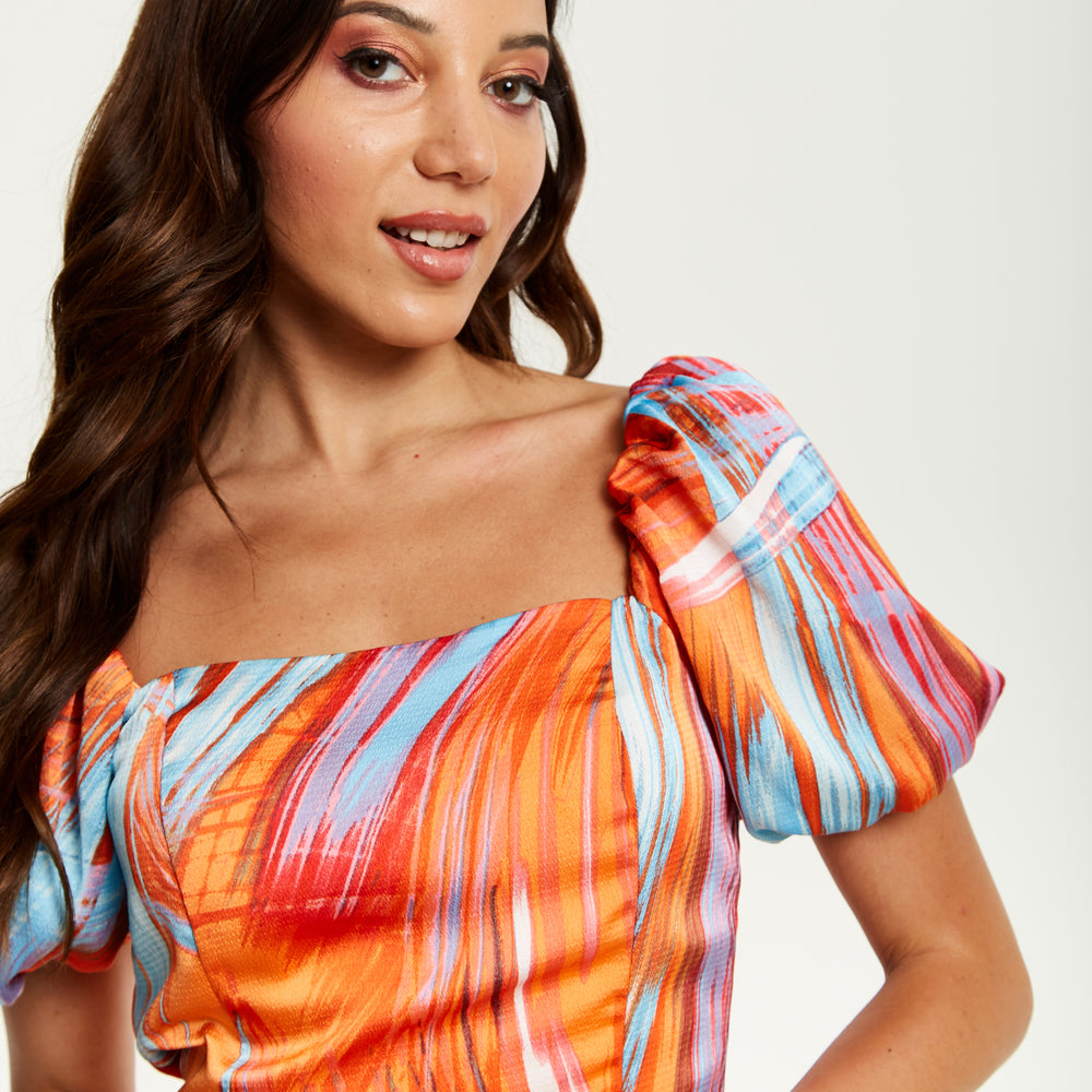 
                  
                    Liquorish Abstract Print Midi Dress With a Square neck and Low Back in Orange
                  
                