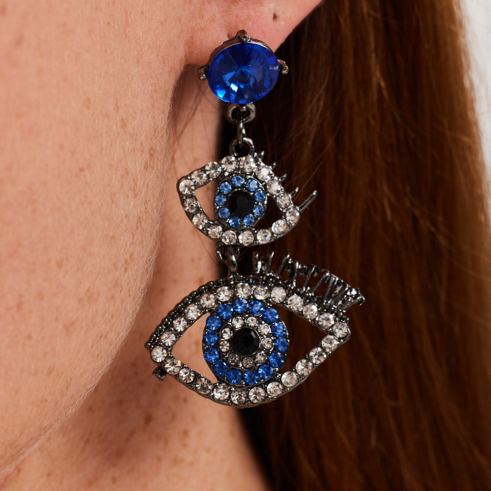 
                  
                    Liquorish Double Evil Eye Drop Style  Earrings With Diamonte Embellishments
                  
                