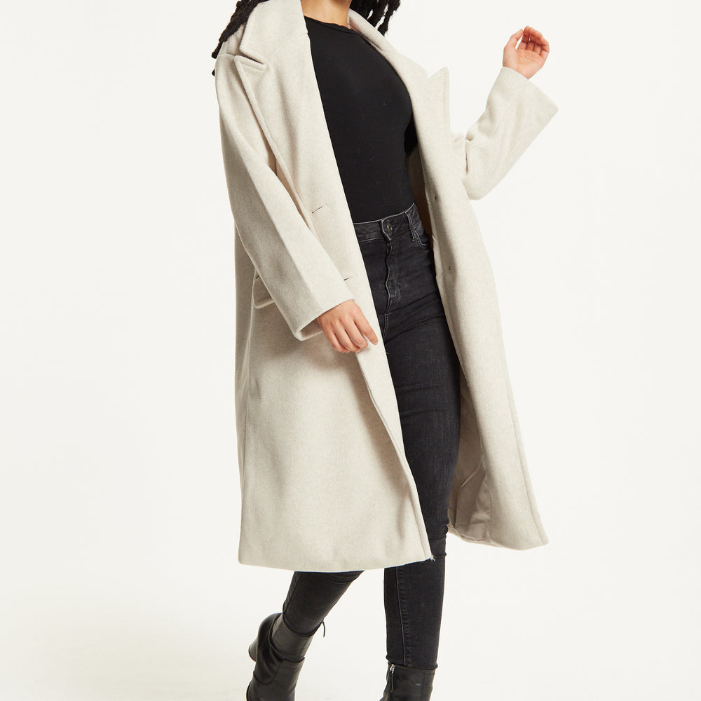 
                  
                    Beige Double Breasted Coat
                  
                