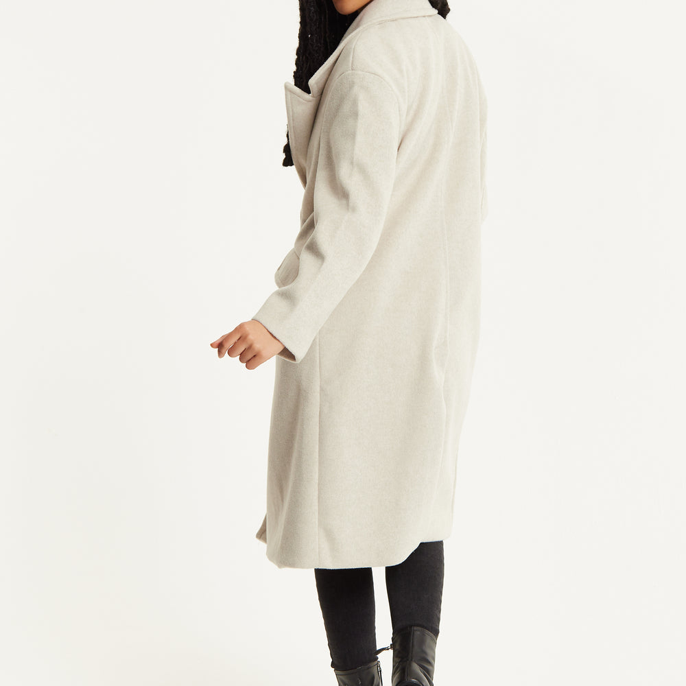 
                  
                    Beige Double Breasted Coat
                  
                