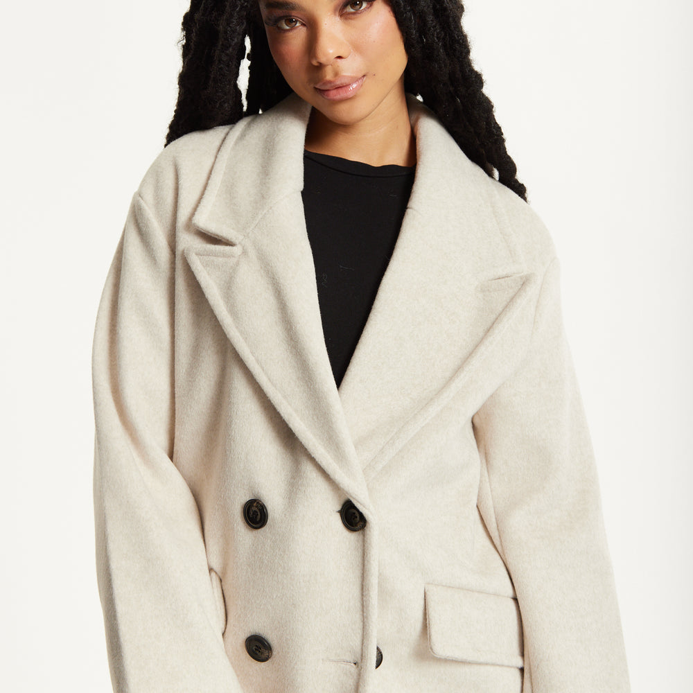 
                  
                    Beige Double Breasted Coat
                  
                