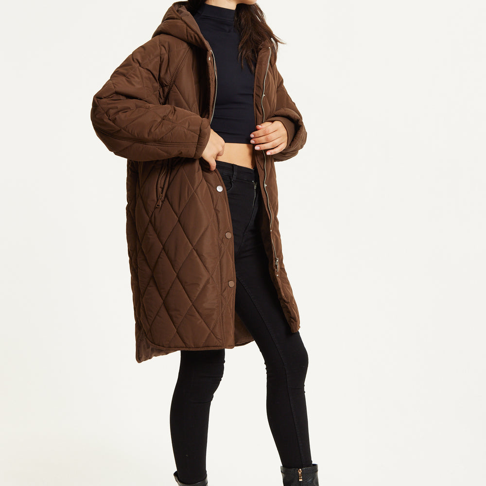 
                  
                    Brown Quilted Oversized Hooded Coat
                  
                
