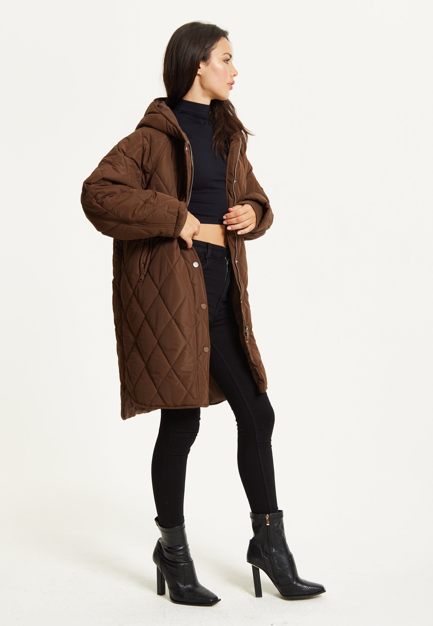 
                  
                    Brown Quilted Oversized Hooded Coat
                  
                