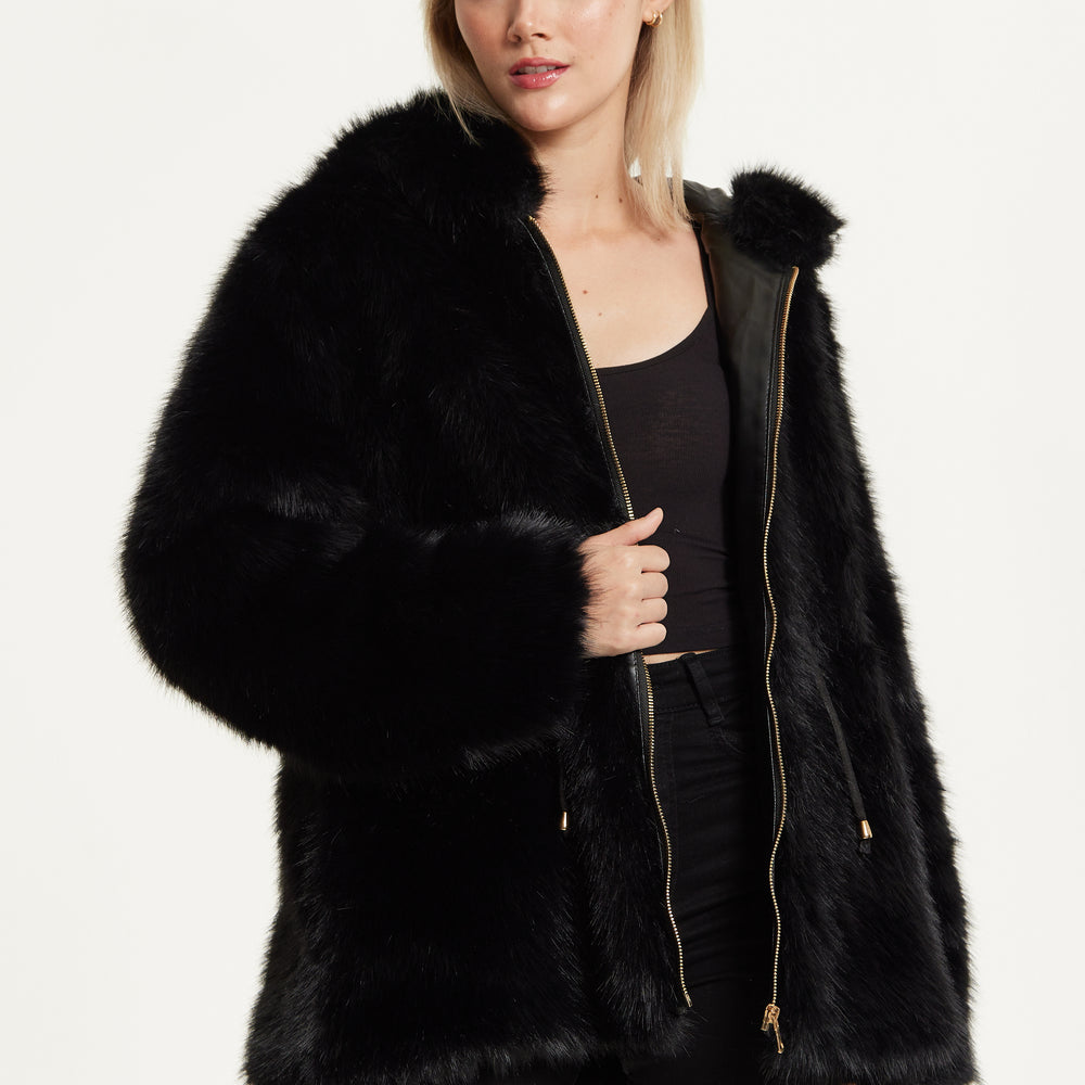 
                  
                    Faux Fur Hooded Coat in Black
                  
                