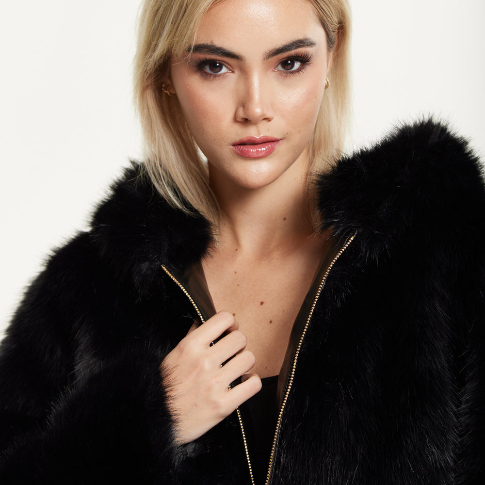 
                  
                    Faux Fur Hooded Coat in Black
                  
                