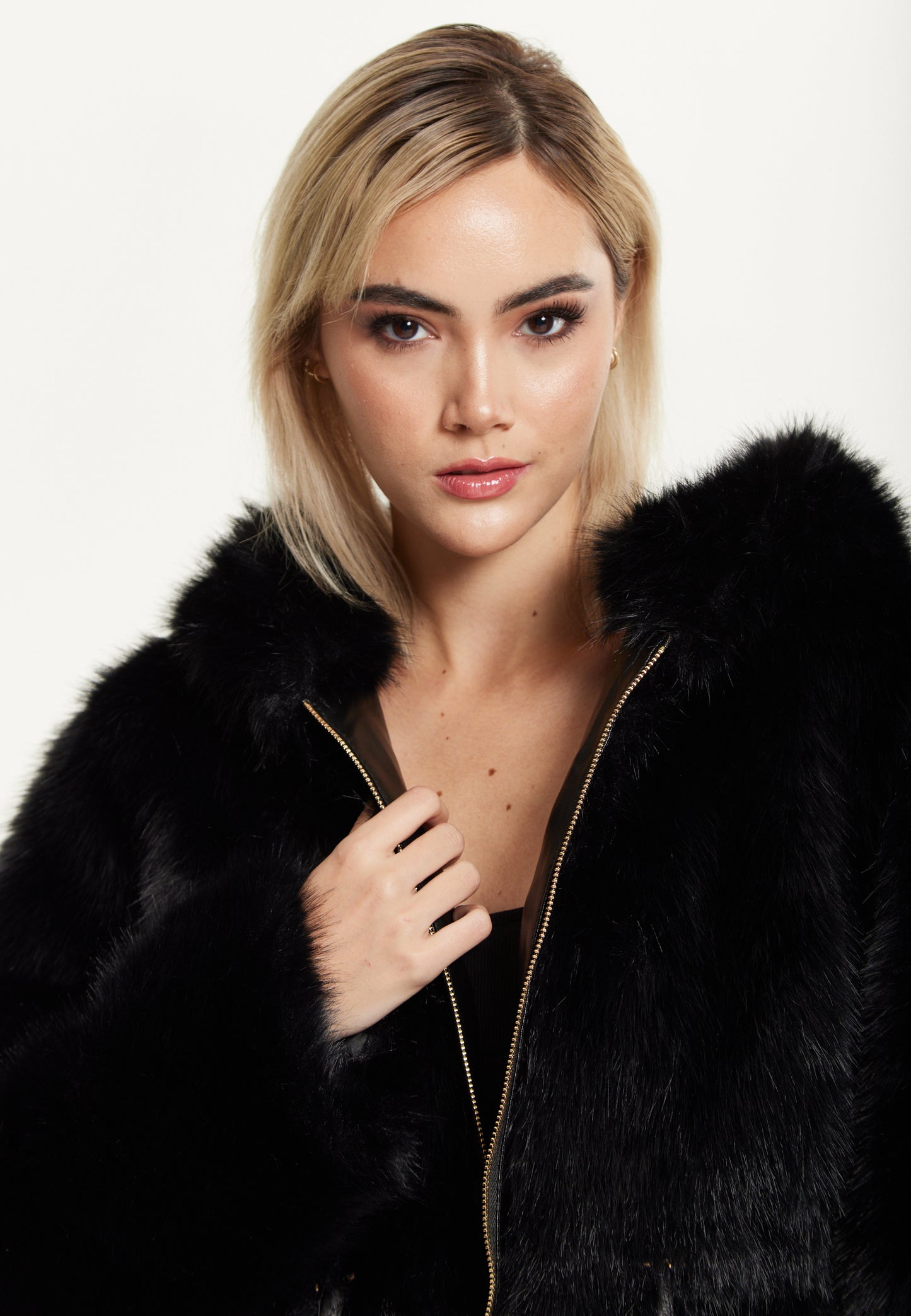 
                  
                    Faux Fur Hooded Coat in Black
                  
                