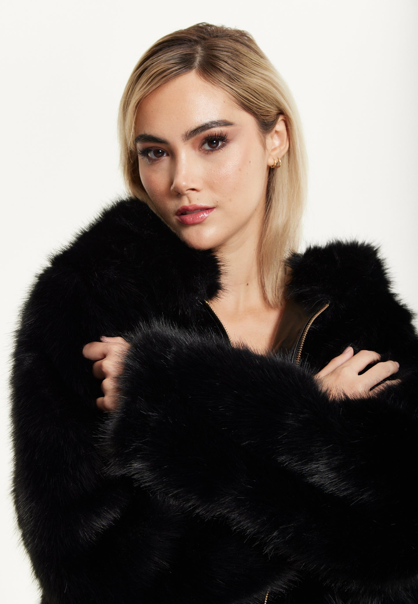 
                  
                    Faux Fur Hooded Coat in Black
                  
                