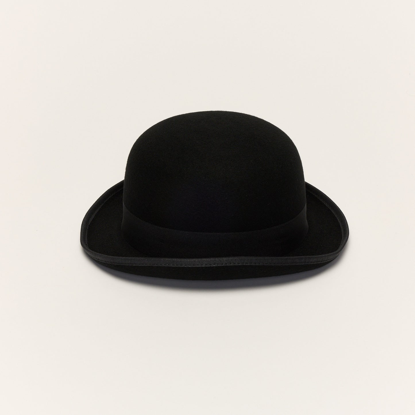 
                  
                    Black Wool Bowler Hat With Curved Brim
                  
                