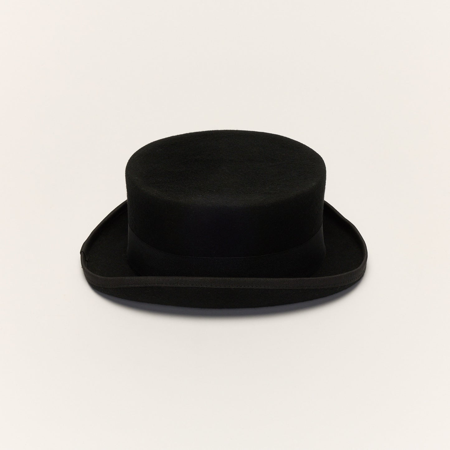 
                  
                    Black Wool Short Crown Feather Top Hat
                  
                