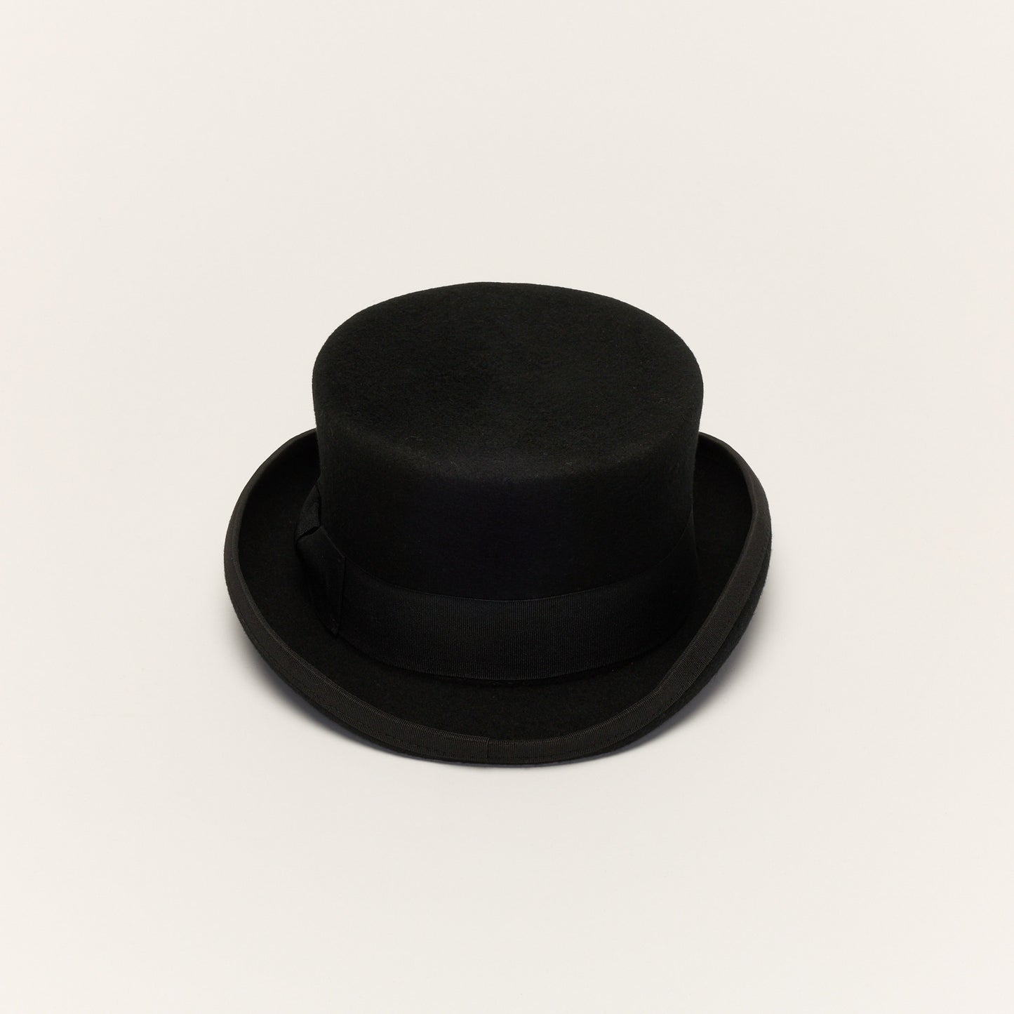 
                  
                    Black Wool Short Crown Feather Top Hat
                  
                