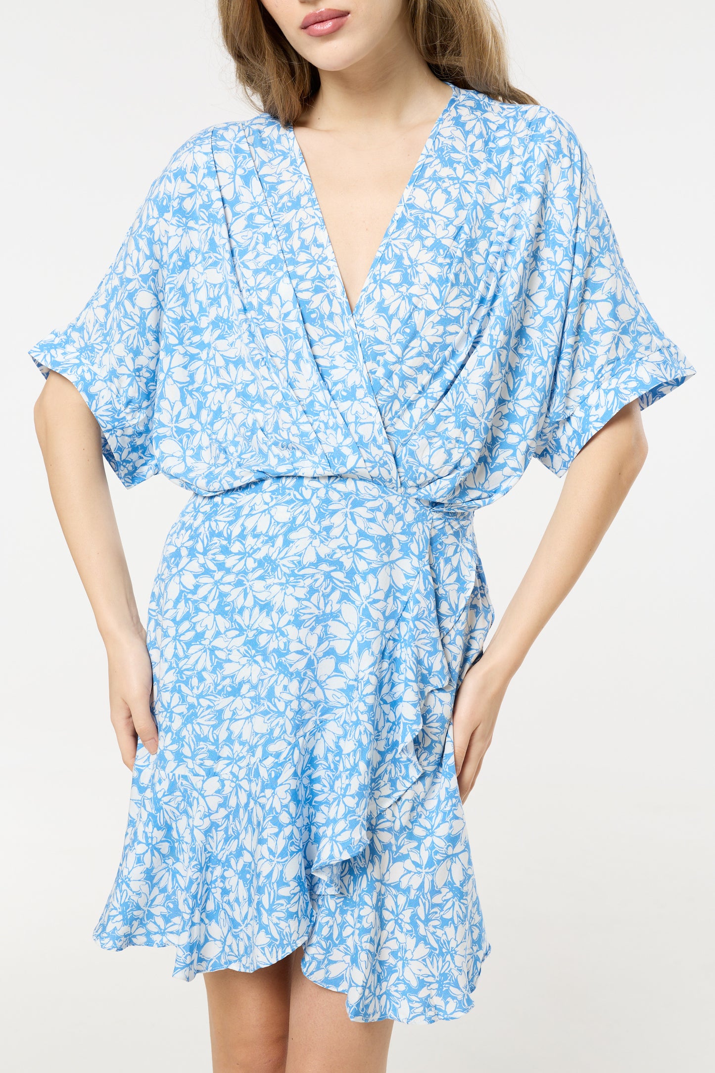 
                  
                    Blue Floral V-Neck Wrap Mini Dress
                  
                