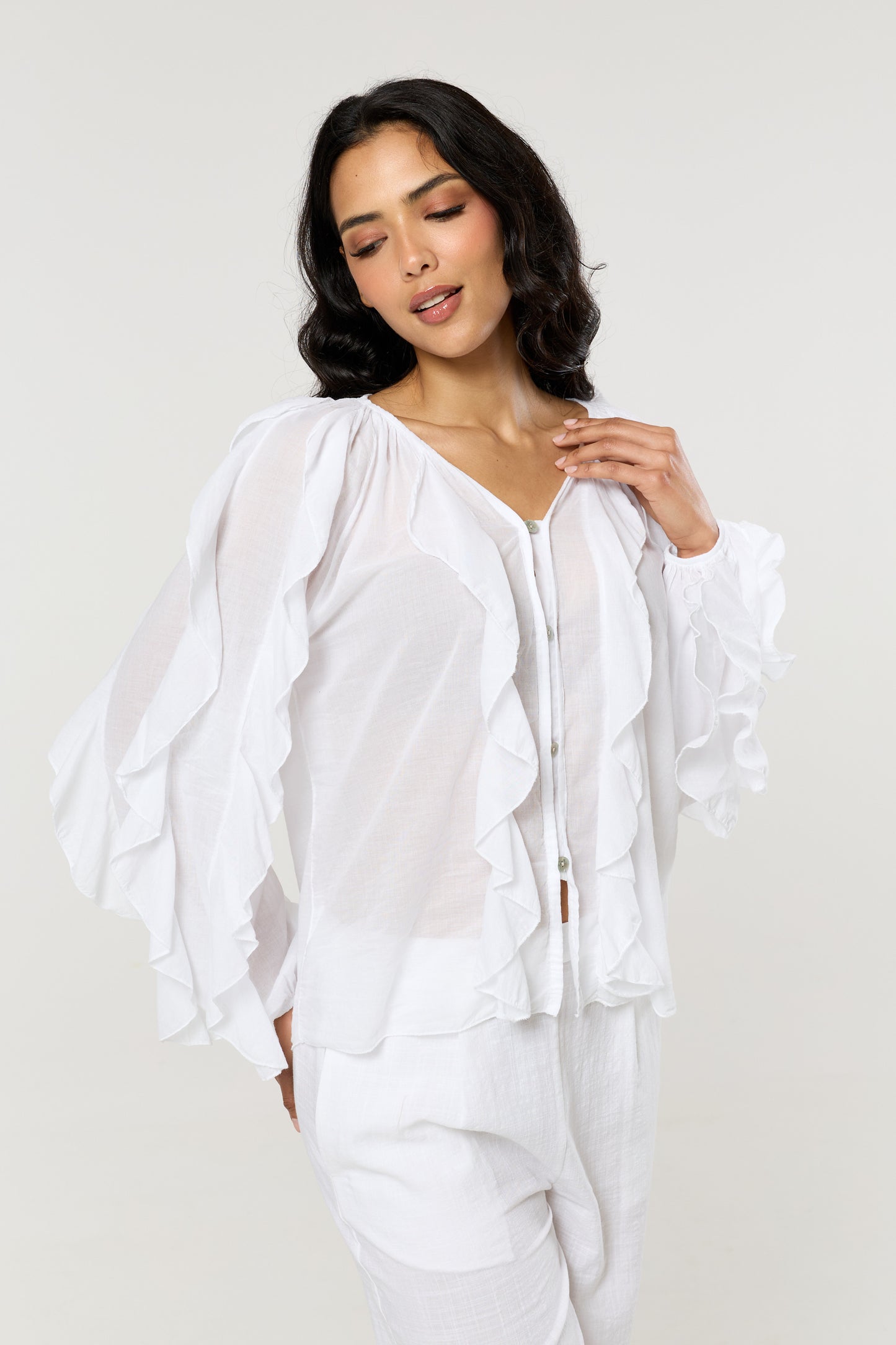
                  
                    White Ruffle Button Down Cotton Blouse
                  
                
