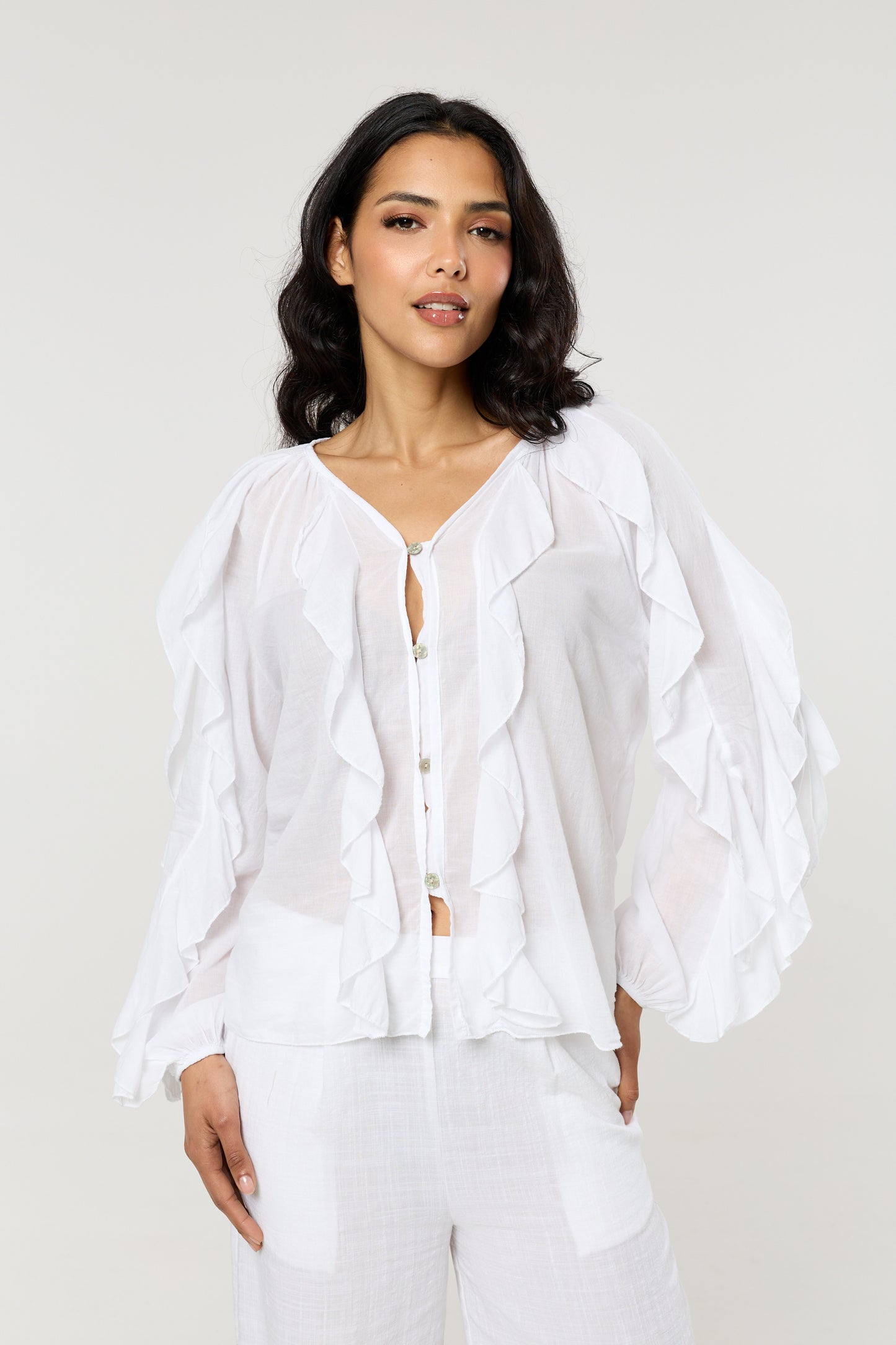 
                  
                    White Ruffle Button Down Cotton Blouse
                  
                