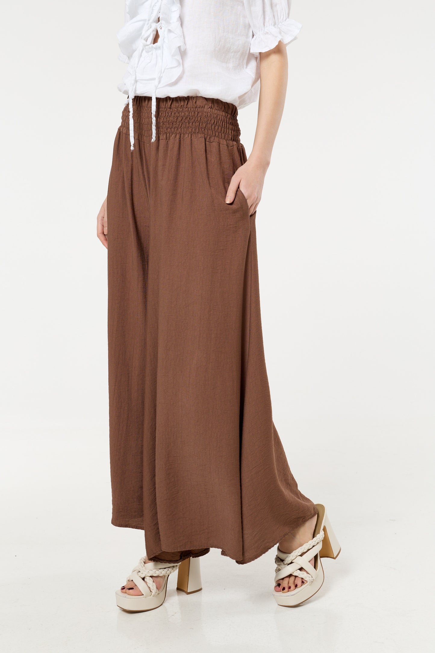 
                  
                    Brown Smocked Wide Leg Trousers
                  
                