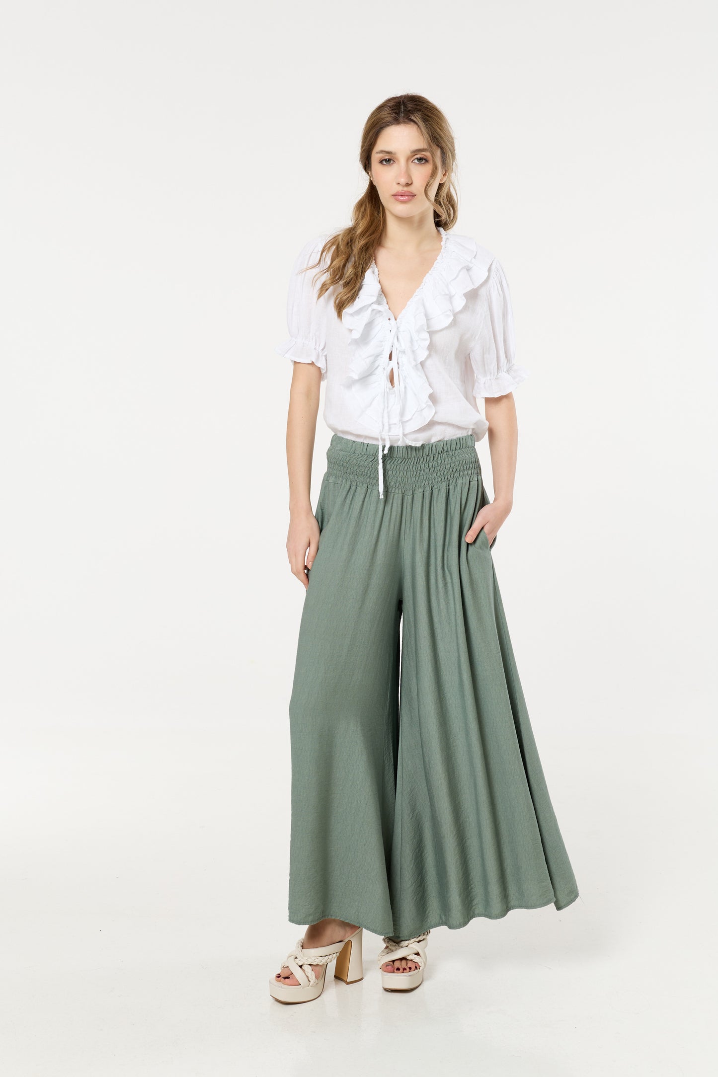 
                  
                    Green Smocked Wide Leg Trousers
                  
                