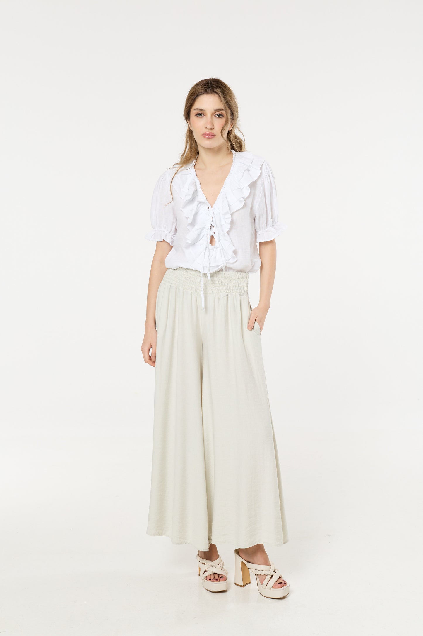 
                  
                    Cream Smocked Wide Leg Trousers
                  
                