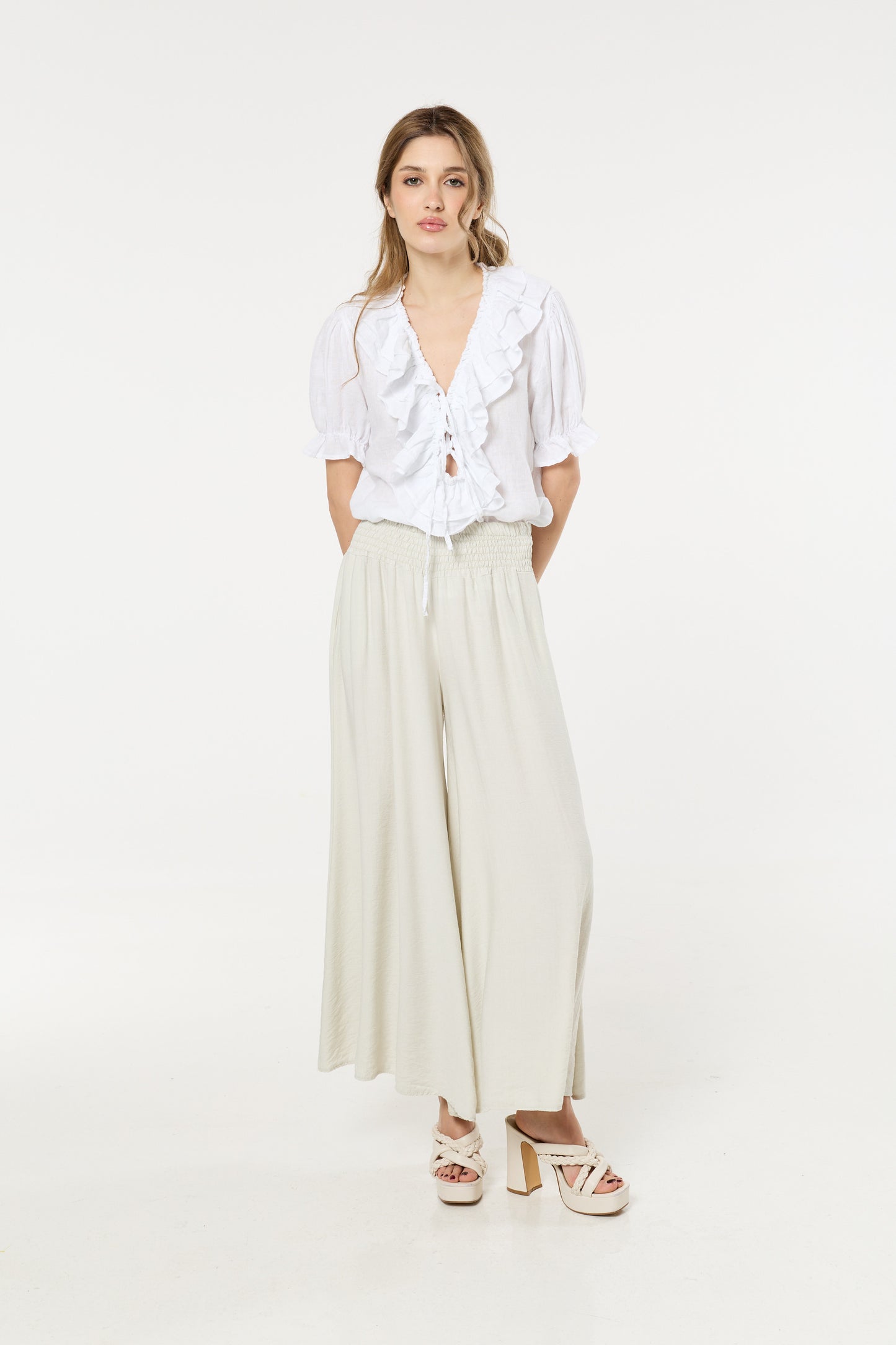 
                  
                    Cream Smocked Wide Leg Trousers
                  
                