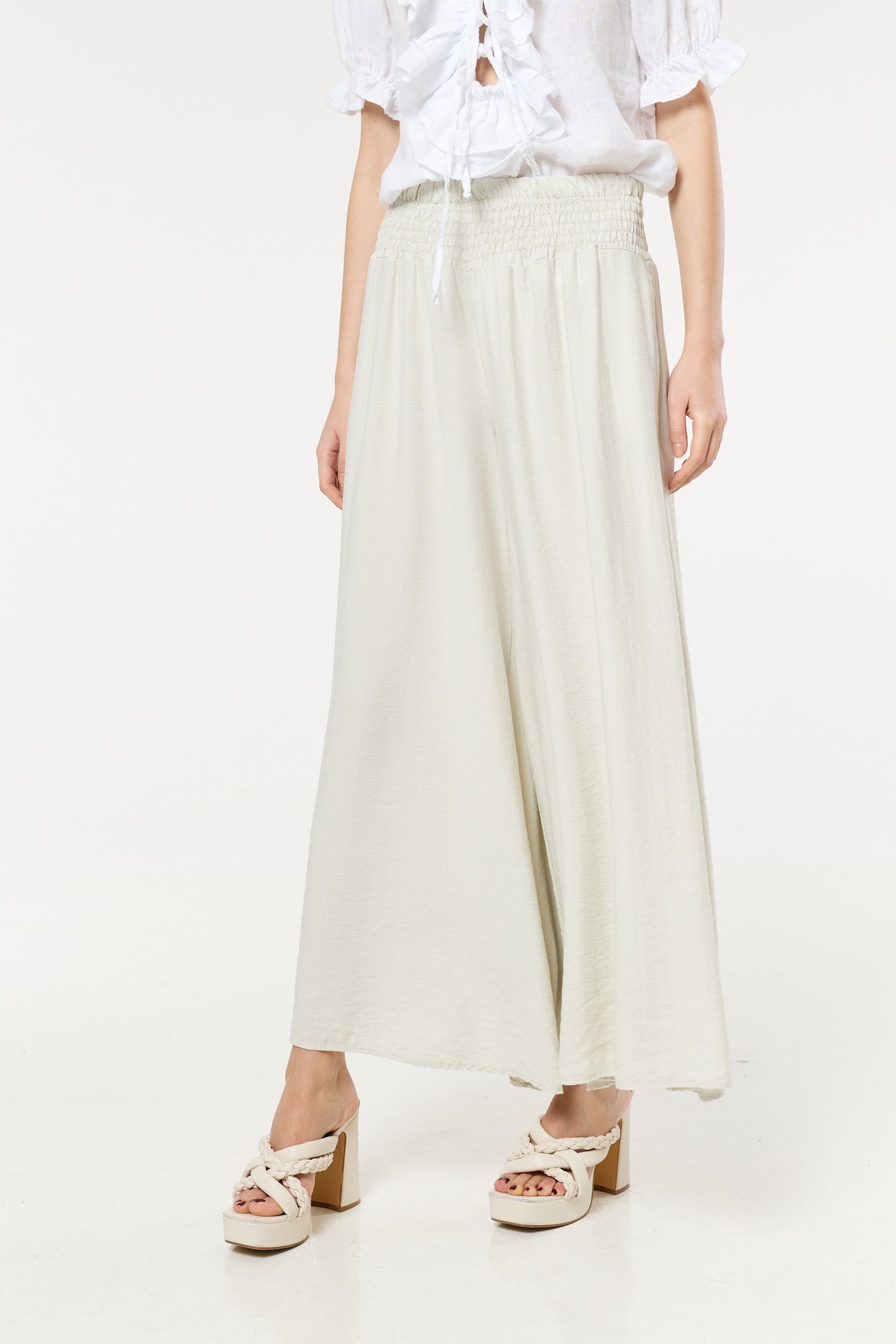 
                  
                    Cream Smocked Wide Leg Trousers
                  
                