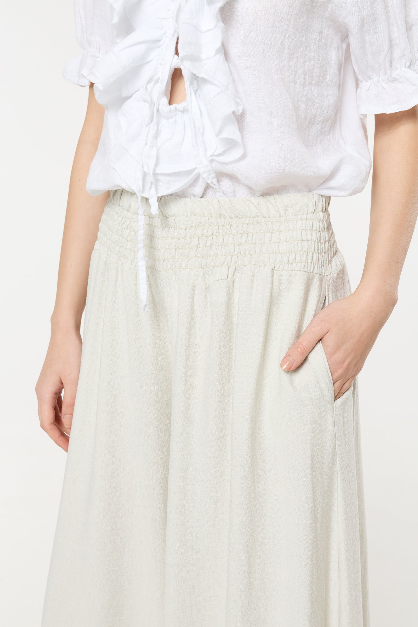 
                  
                    Cream Smocked Wide Leg Trousers
                  
                