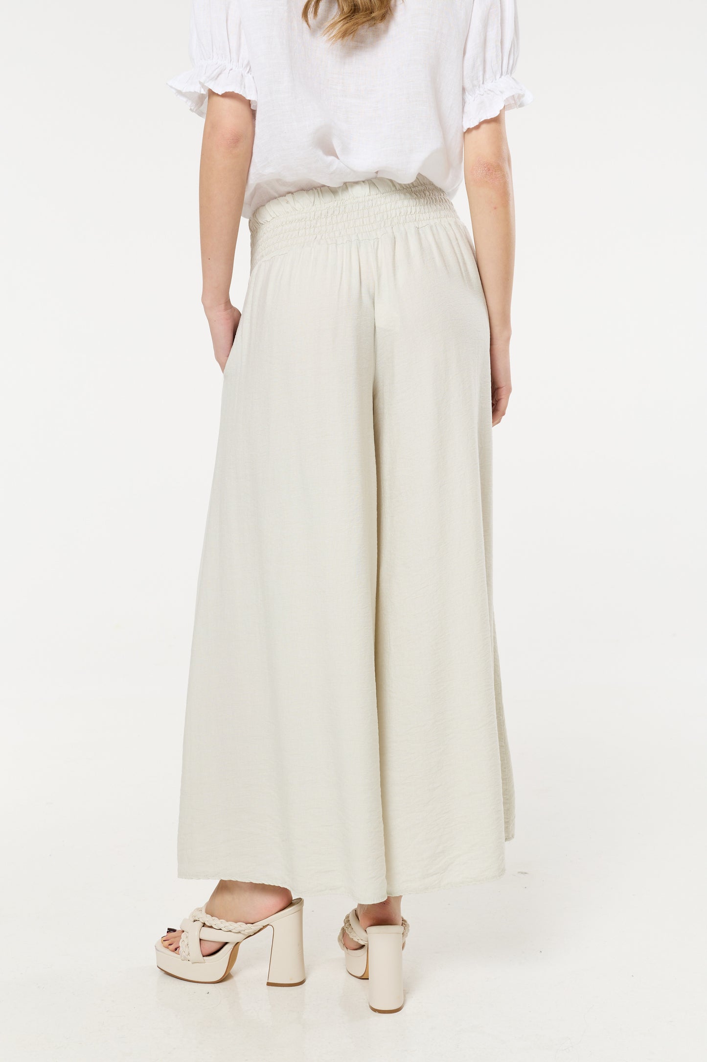 
                  
                    Cream Smocked Wide Leg Trousers
                  
                
