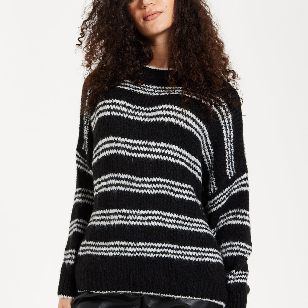 
                  
                    Women's Jumper - Oversized Black and White Striped Knit Sweater with Long Sleeves, Super Soft Comfort and Chic Style
                  
                