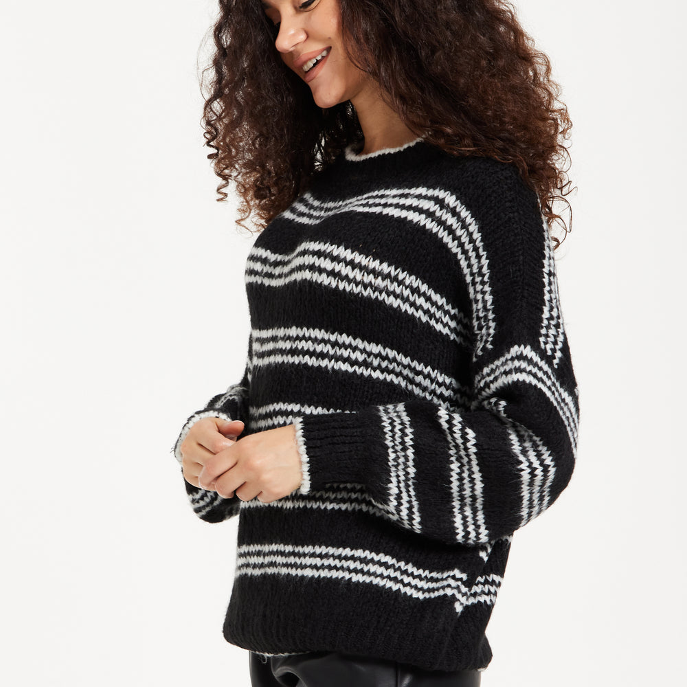 
                  
                    Women's Jumper - Oversized Black and White Striped Knit Sweater with Long Sleeves, Super Soft Comfort and Chic Style
                  
                