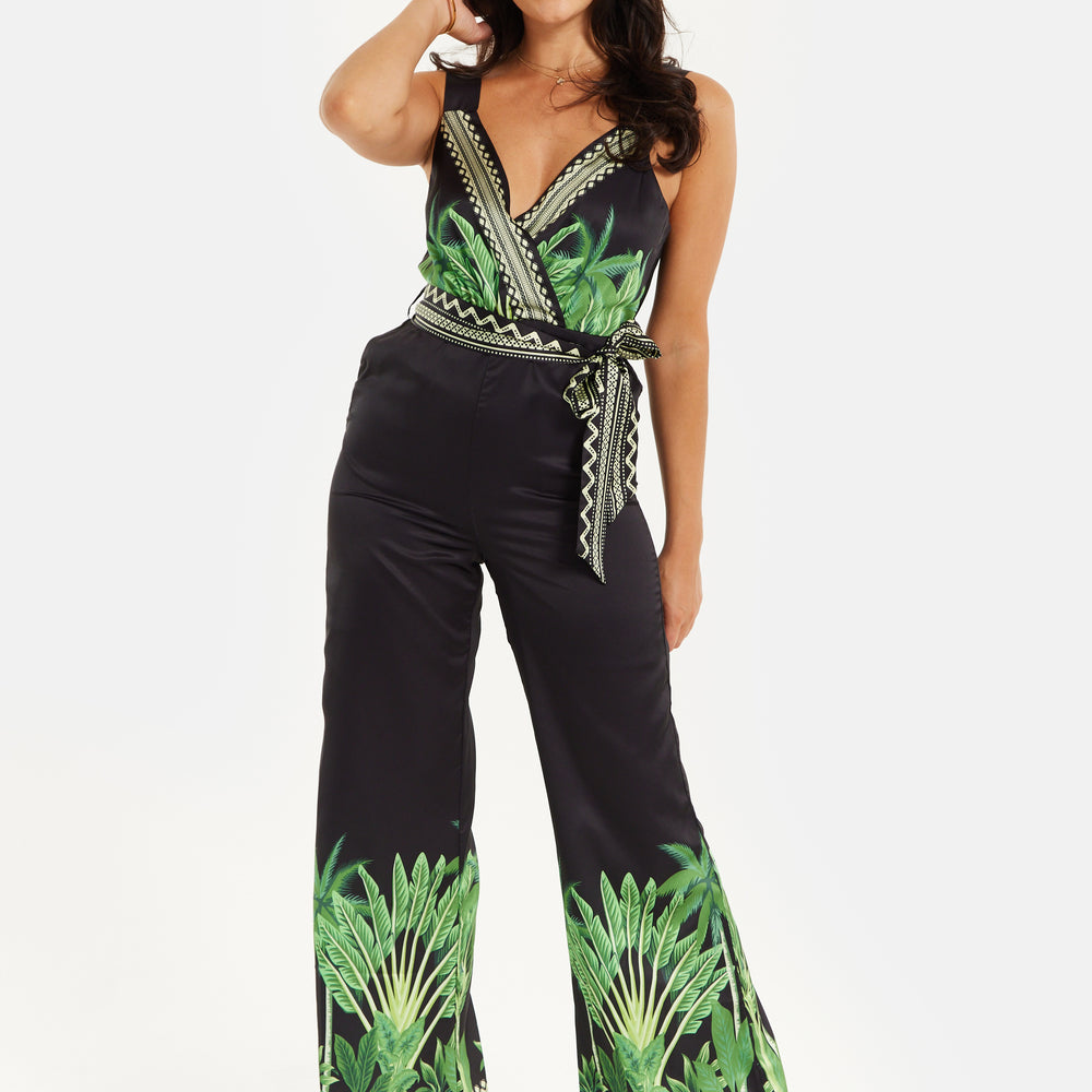 
                  
                    Liquorish Leaf Printed V-neck Jumpsuit With Tie Detail
                  
                