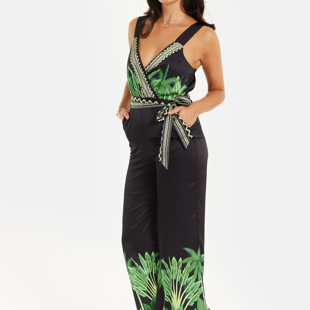 
                  
                    Liquorish Leaf Printed V-neck Jumpsuit With Tie Detail
                  
                