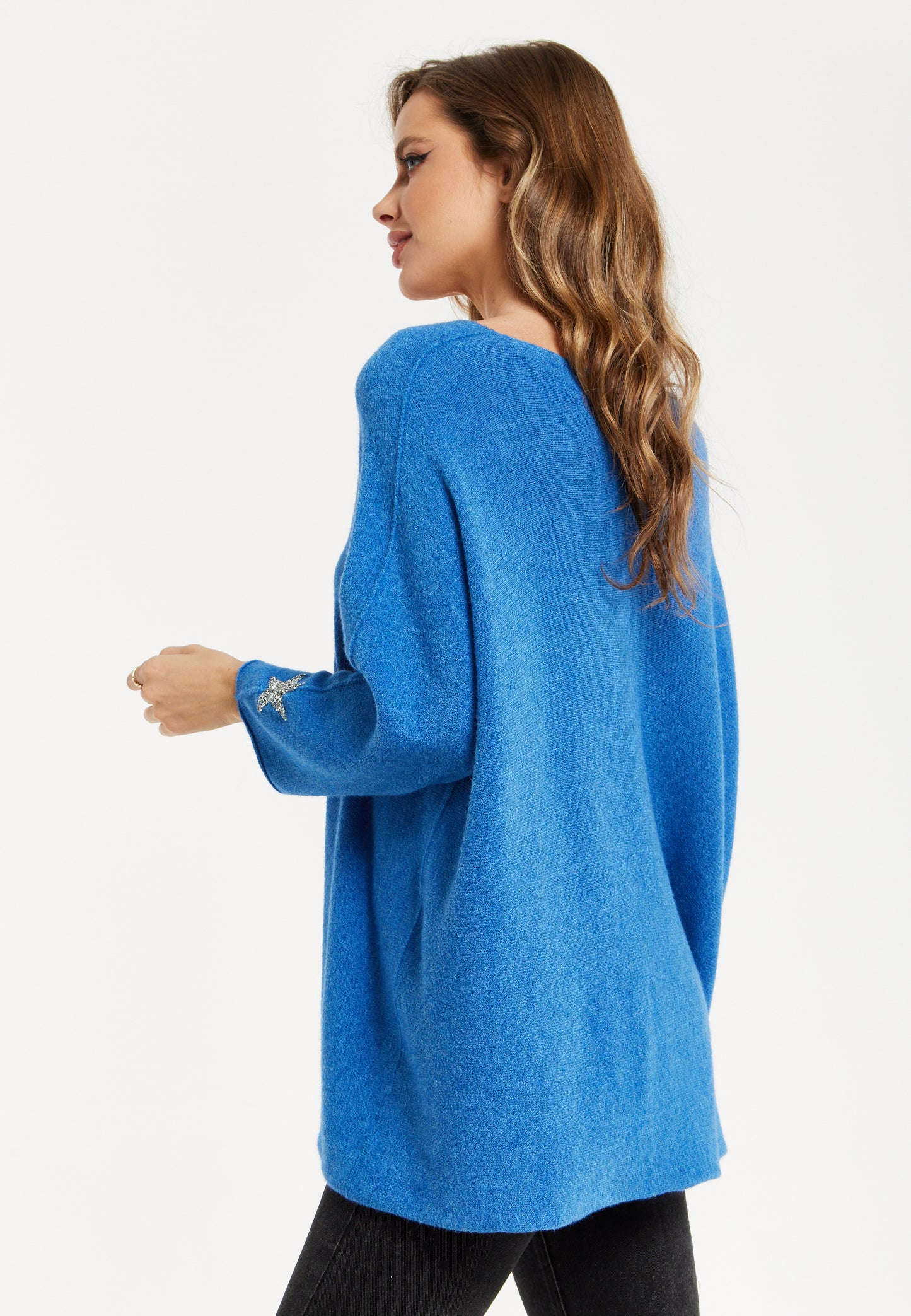 
                  
                    Liquorish Women's Blue Oversized V-Neck Jumper with Long Sleeves and Star Embellishments
                  
                