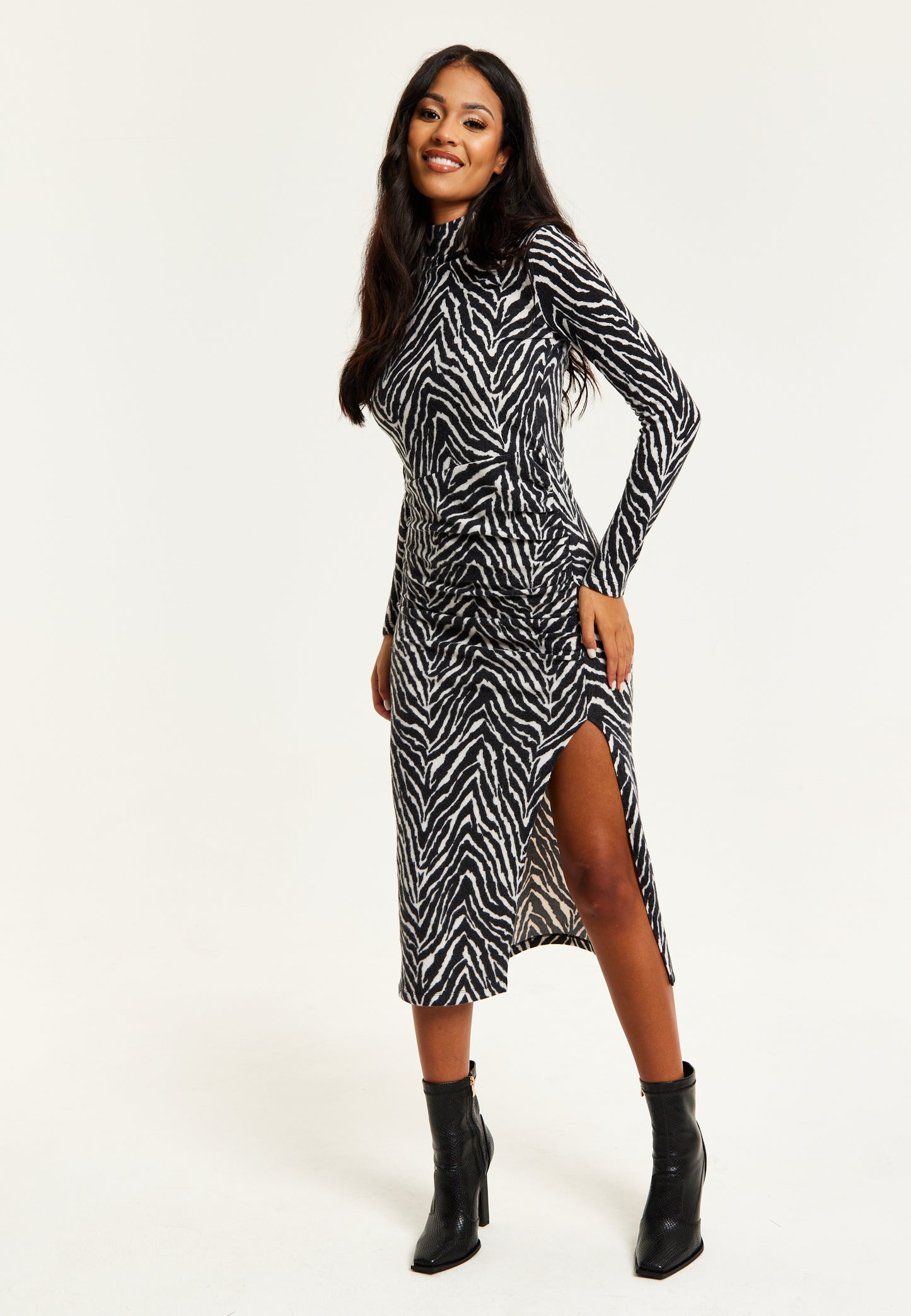 
                  
                    Liquorish Brushed Knit Mono Zebra Print Midi Dress With Front Slit
                  
                