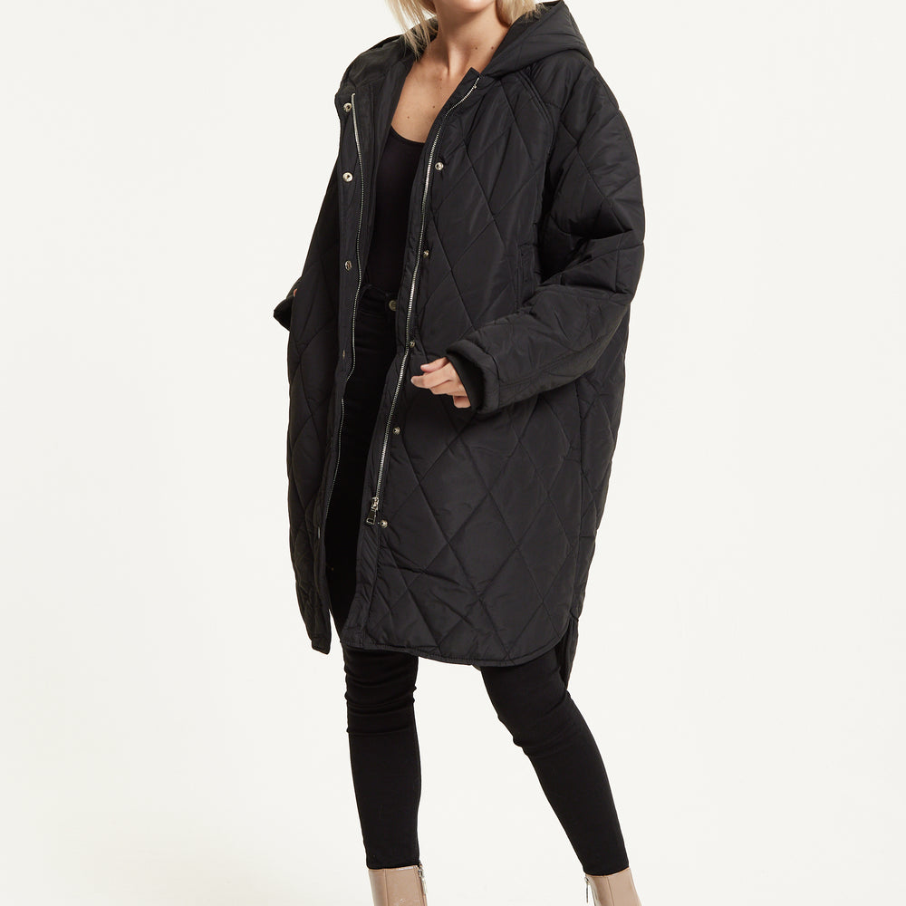 
                  
                    Black Quilted Oversized Hooded Coat
                  
                
