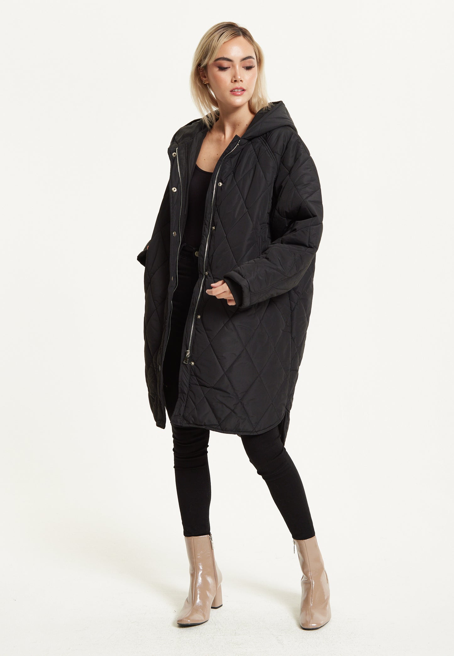
                  
                    Black Quilted Oversized Hooded Coat
                  
                