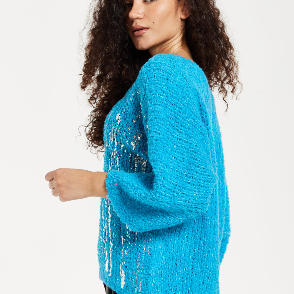 
                  
                    Women's Jumper in Blue with Loose Knit Design, Wide Sleeves & Metallic Detail for Effortless Style
                  
                