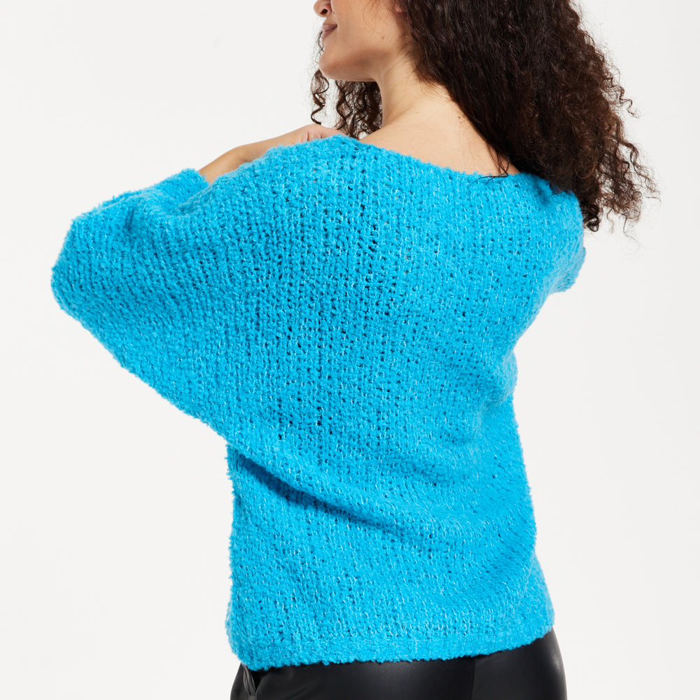 
                  
                    Women's Jumper in Blue with Loose Knit Design, Wide Sleeves & Metallic Detail for Effortless Style
                  
                