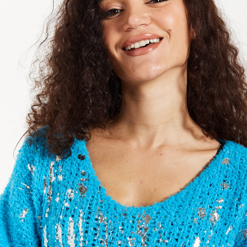 
                  
                    Women's Jumper in Blue with Loose Knit Design, Wide Sleeves & Metallic Detail for Effortless Style
                  
                