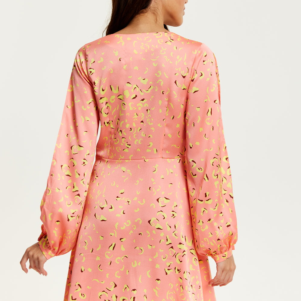 
                  
                    Liquorish Abstract Animal Print Mini Dress In Peach with Slit Sleeves
                  
                
