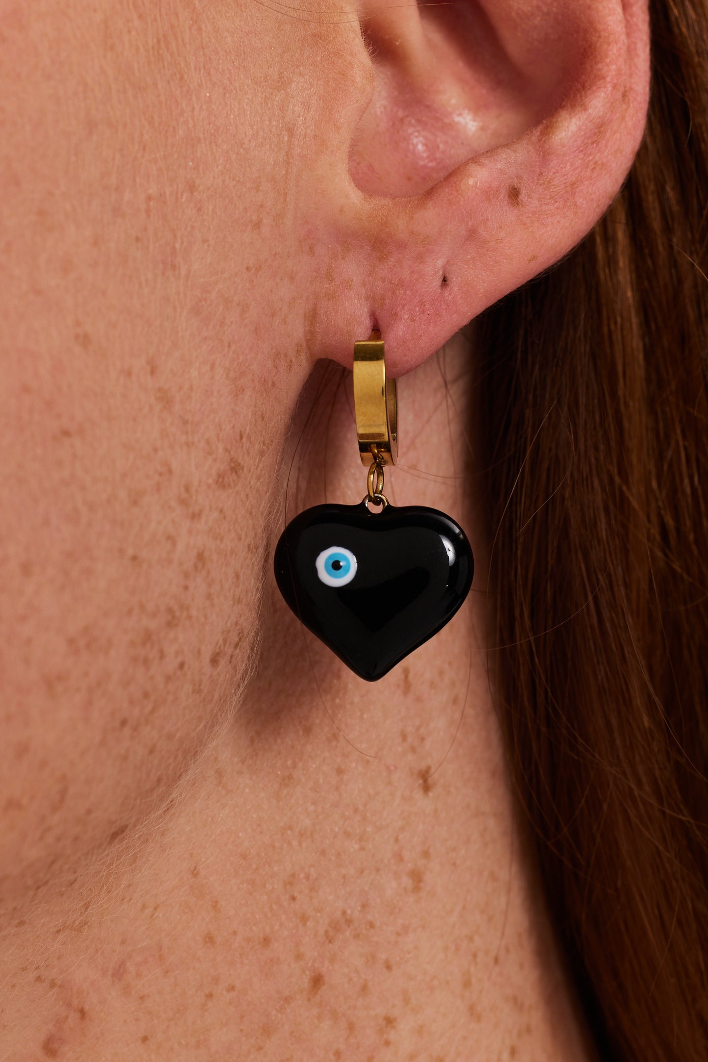 
                  
                    Liquorish Black Heart Small Gold Hoop  Earrings With Evil Eye Detail
                  
                