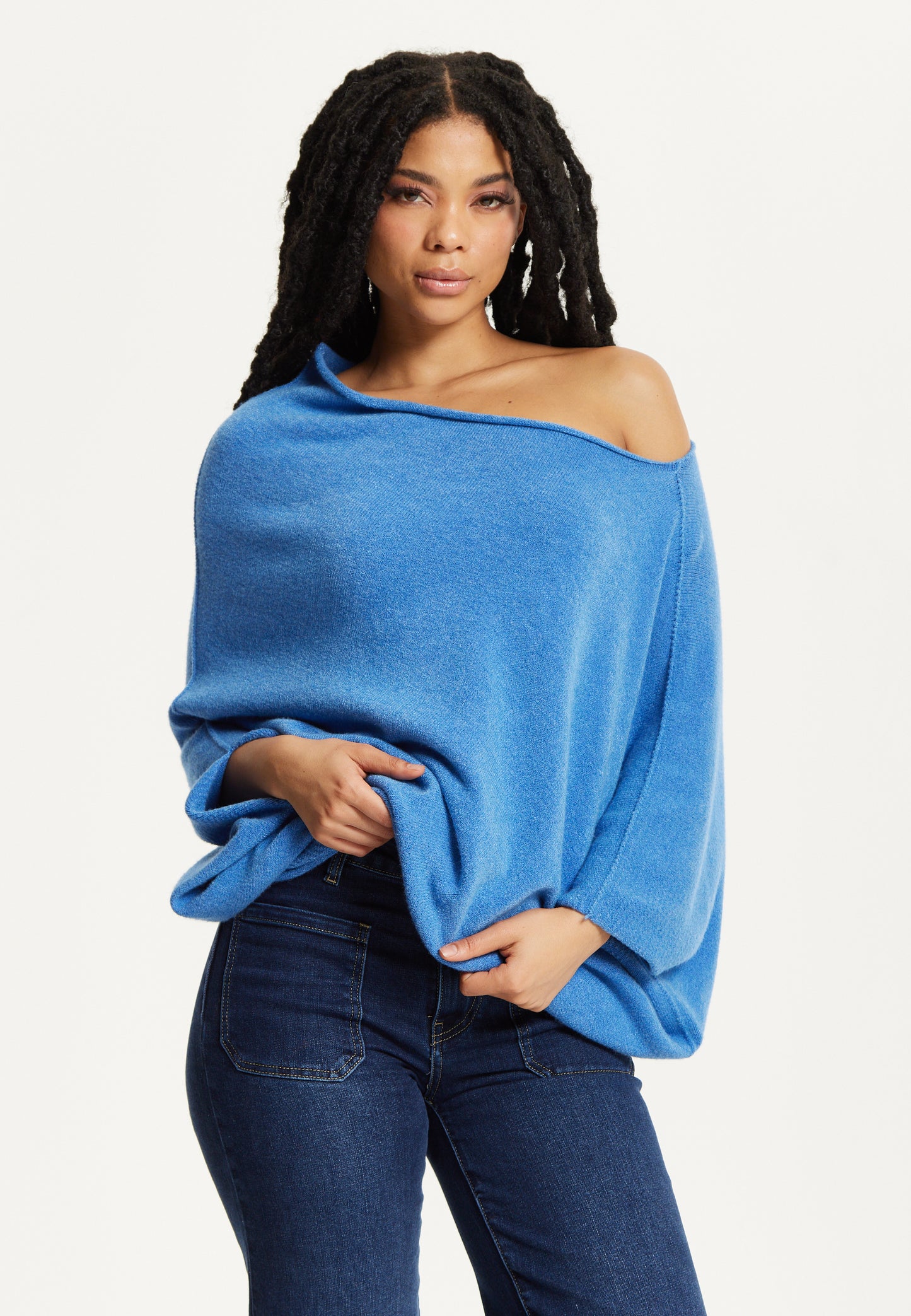 
                  
                    Blue Off-Shoulder Knit Poncho Top
                  
                