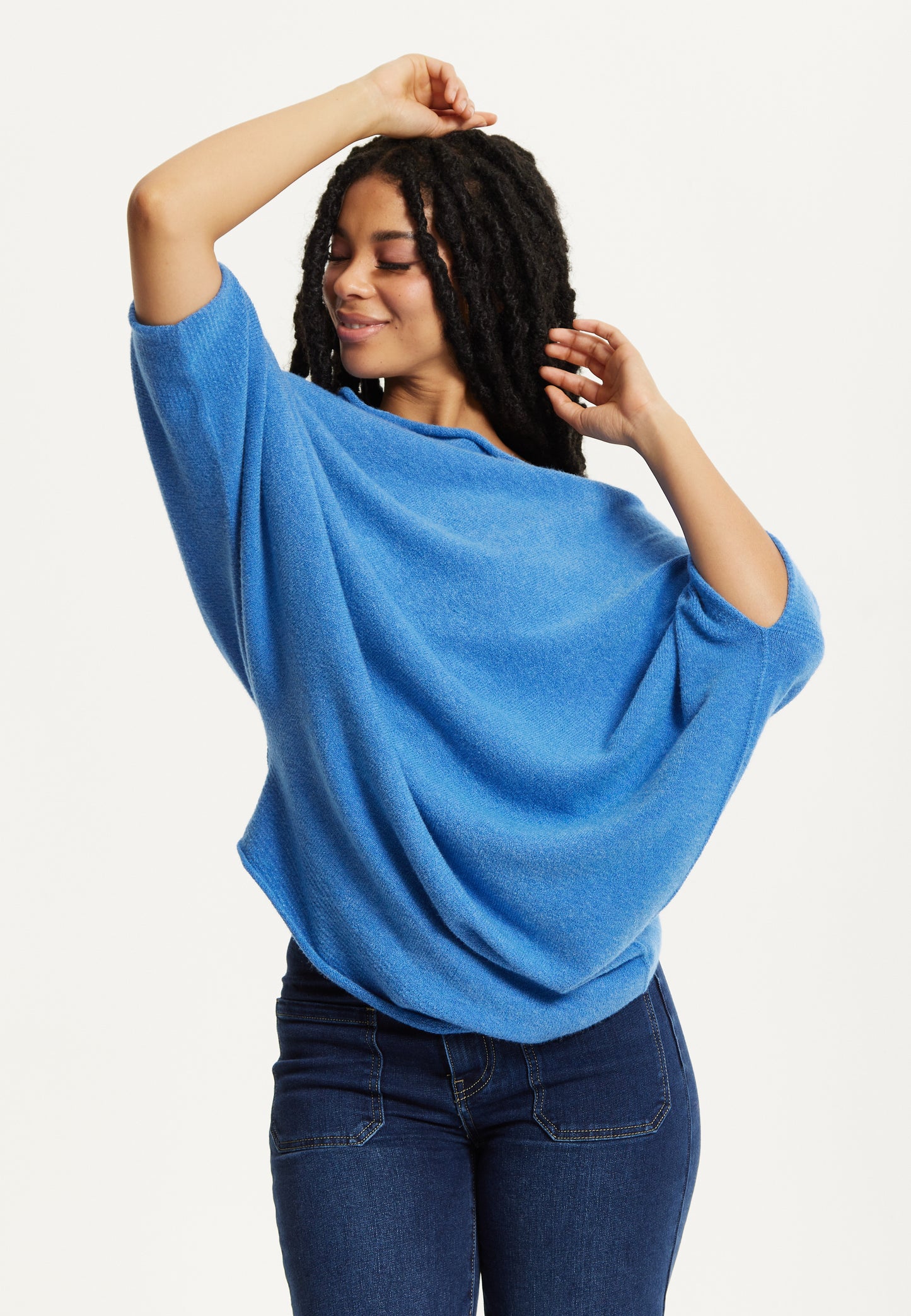 
                  
                    Blue Off-Shoulder Knit Poncho Top
                  
                