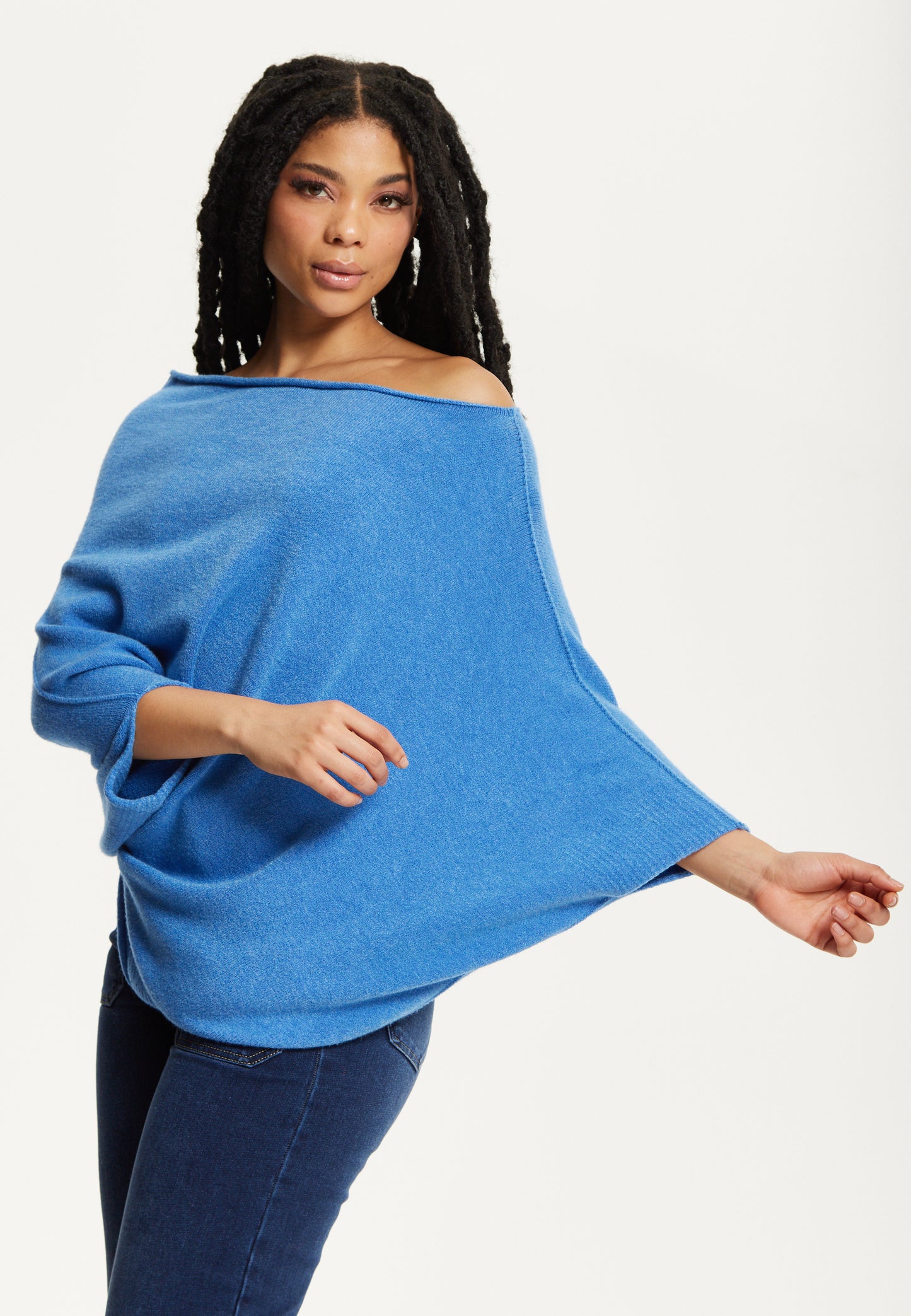 
                  
                    Blue Off-Shoulder Knit Poncho Top
                  
                