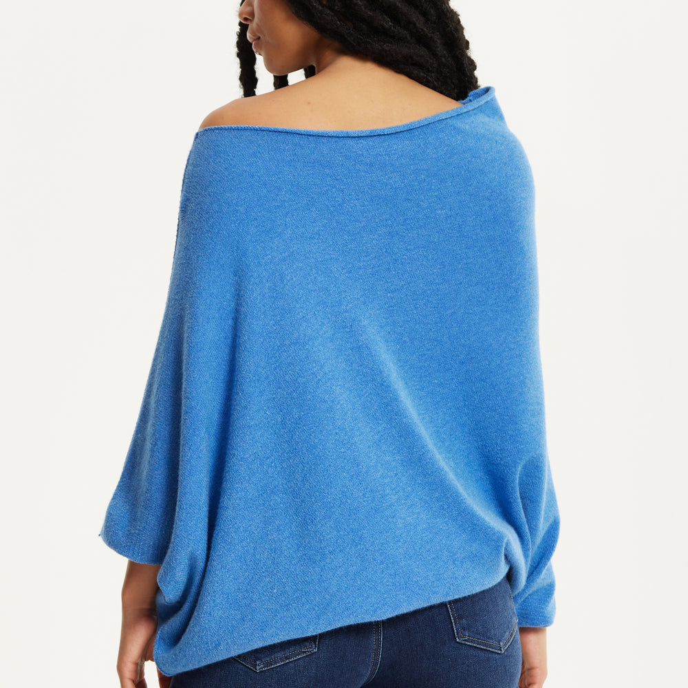 
                  
                    Blue Off-Shoulder Knit Poncho Top
                  
                