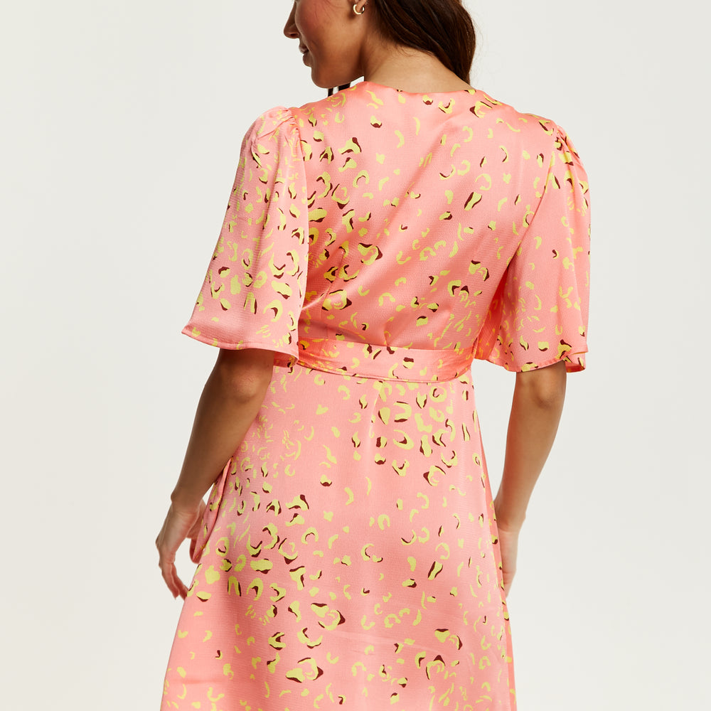 
                  
                    Liquorish Mini Abstract Animal Print Wrap Dress in Peach
                  
                