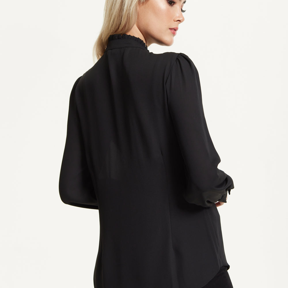 
                  
                    Black Ruffle Front Blouse
                  
                