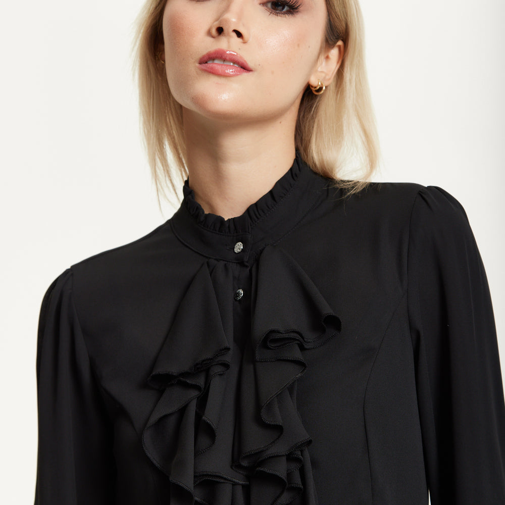 
                  
                    Black Ruffle Front Blouse
                  
                