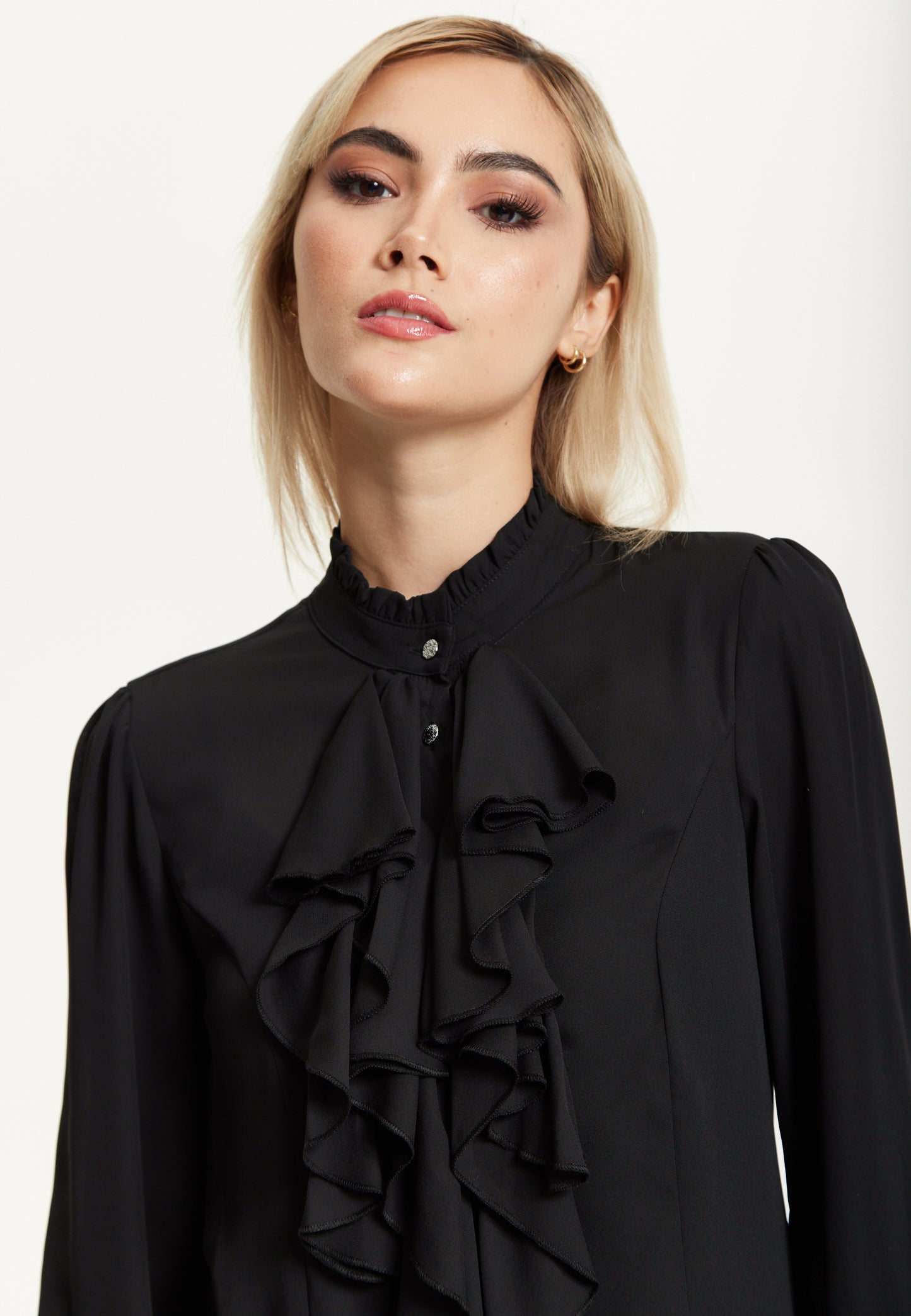 
                  
                    Black Ruffle Front Blouse
                  
                